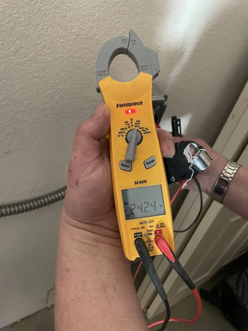 Voltage testing with clamp meter during Generator Installation in Van Alstyne